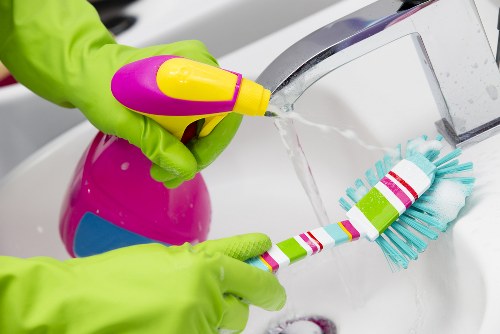 Cleaning technician preparing a carpet cleaning service
