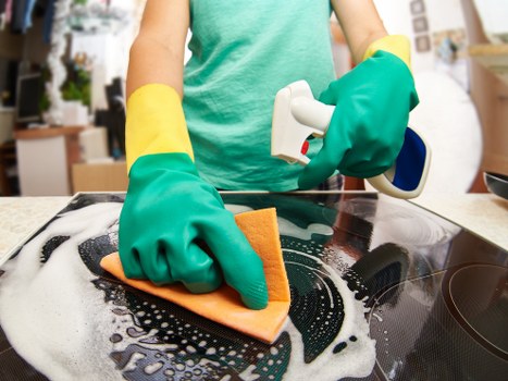 Professional cleaner maintaining a tidy property in EN5